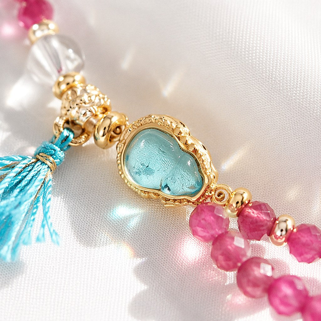 Pisces zodiac triple-wrap bracelet with faceted pink tourmaline and aquamarine mini beads, gold-tone Pisces charm, aquam