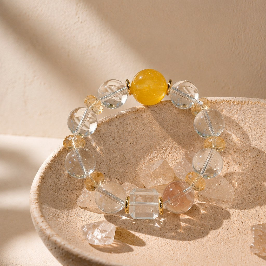 Inner Light citrine bracelet with golden citrine focal bead, clear quartz rounds and pink strawberry quartz accents