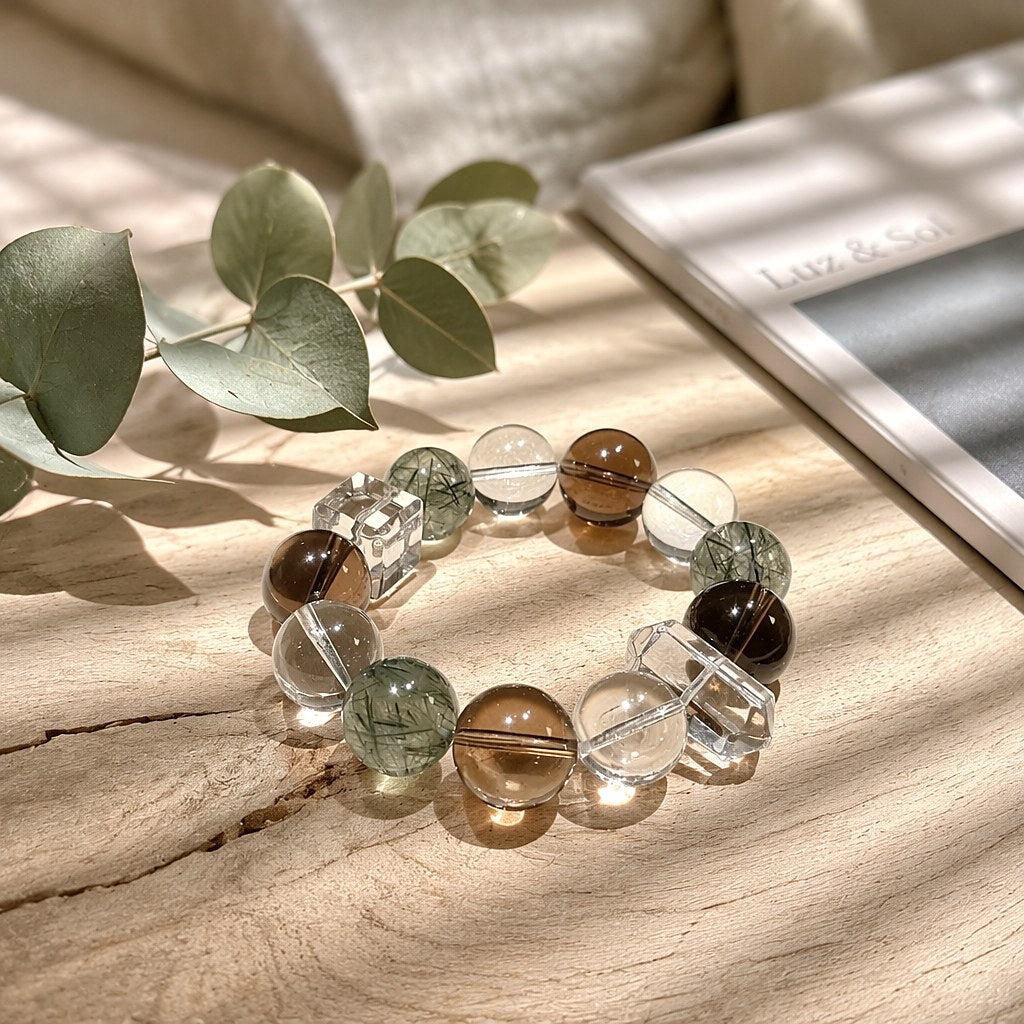 Misty Grove bracelet with large 14mm smoky quartz, green rutilated quartz and clear quartz beads on clear elastic cord