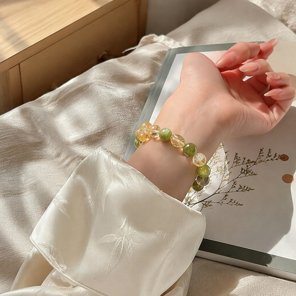 Lemon Bubble citrine, Xiuyan jade and clear quartz beaded stretch bracelet with carved citrine flower bead