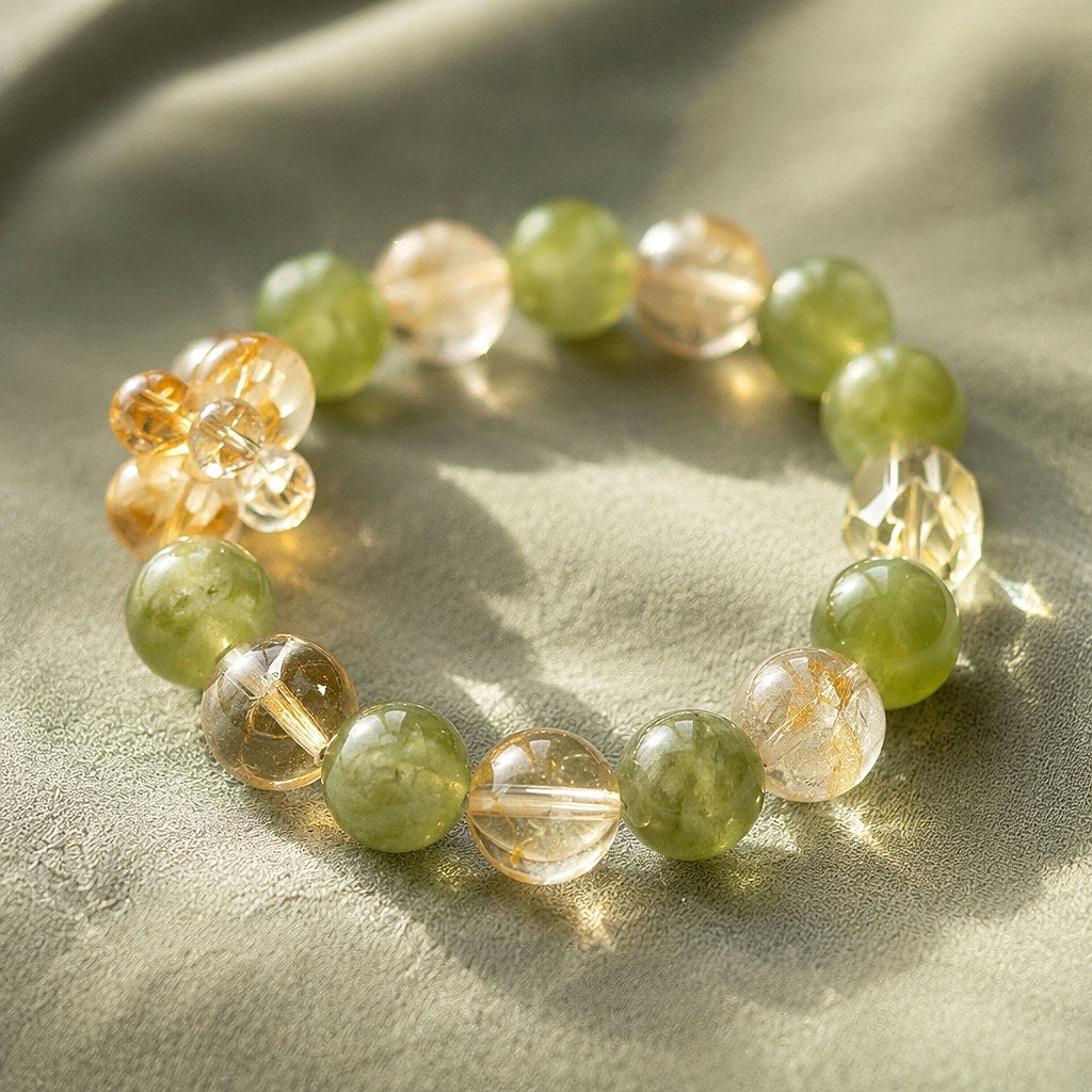 Lemon Bubble citrine, Xiuyan jade and clear quartz beaded stretch bracelet with carved citrine flower bead