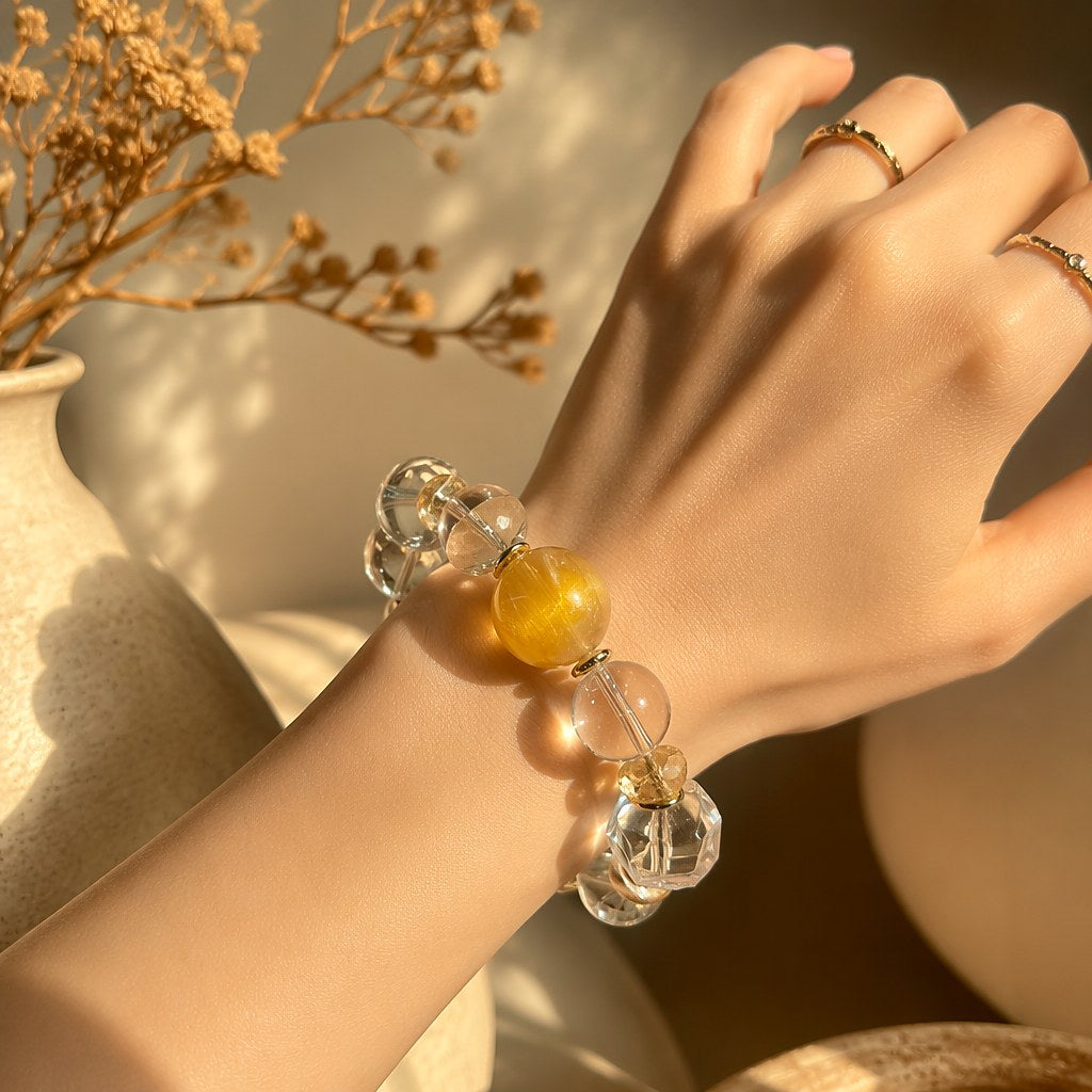 Inner Light citrine bracelet with golden citrine focal bead, clear quartz rounds and pink strawberry quartz accents