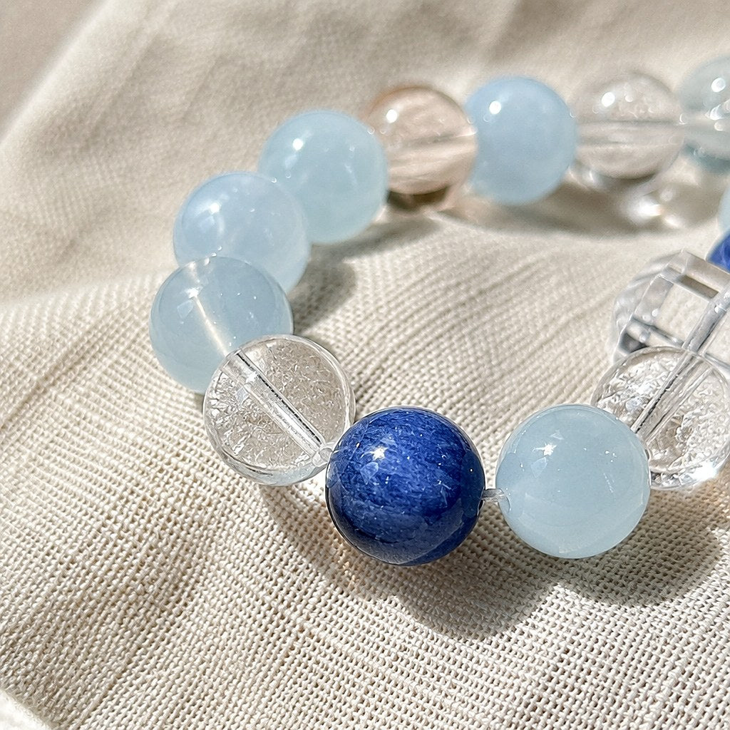 Aura of Serenity aquamarine, kyanite and clear quartz beaded stretch bracelet with faceted double-terminated clear quart