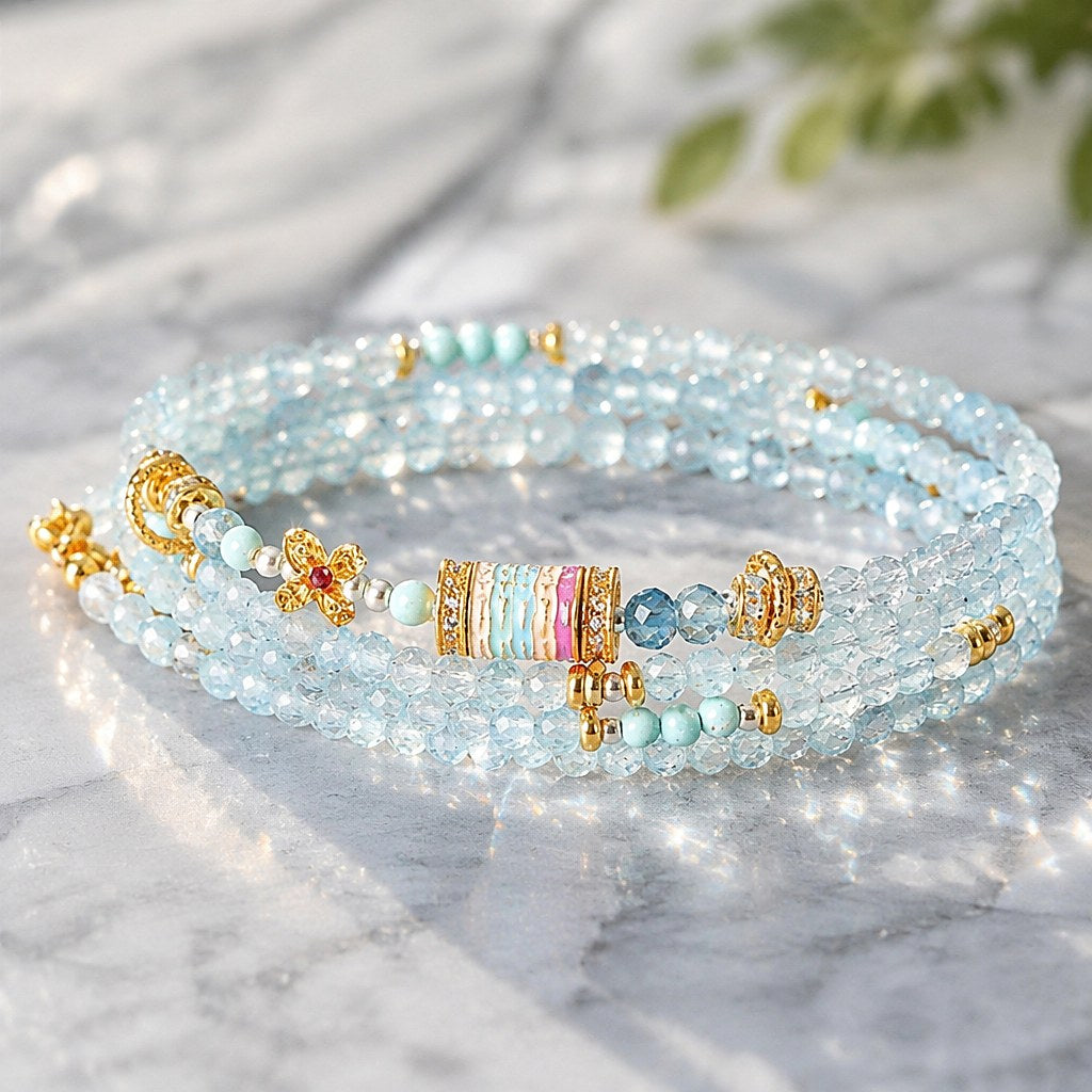 Cancer zodiac triple-wrap bracelet in 3mm faceted aquamarine with turquoise accents, five-color enamel barrel bead, gold