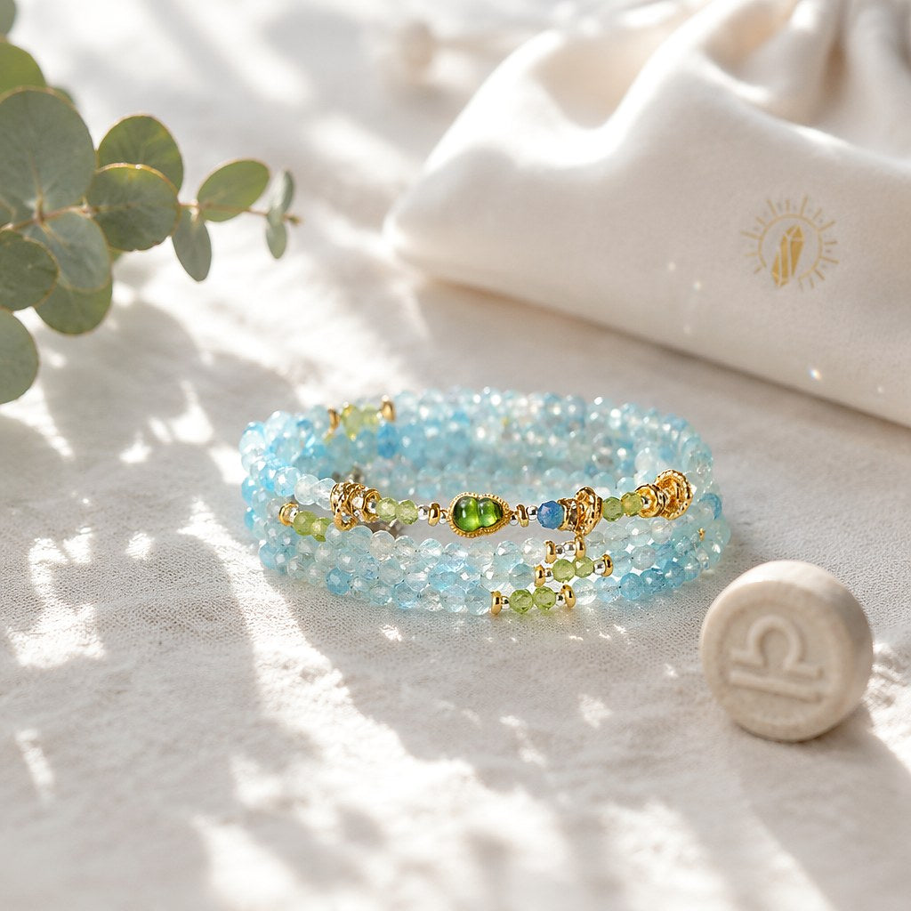 Libra zodiac triple-wrap bracelet with faceted aquamarine and 3mm prehnite mini beads, gold-tone gourd charm and silk ta