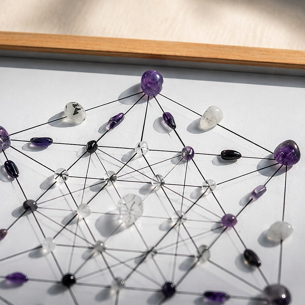 Inner Dawn amethyst, rainbow moonstone and clear quartz crystal grid in a light natural wood frame
