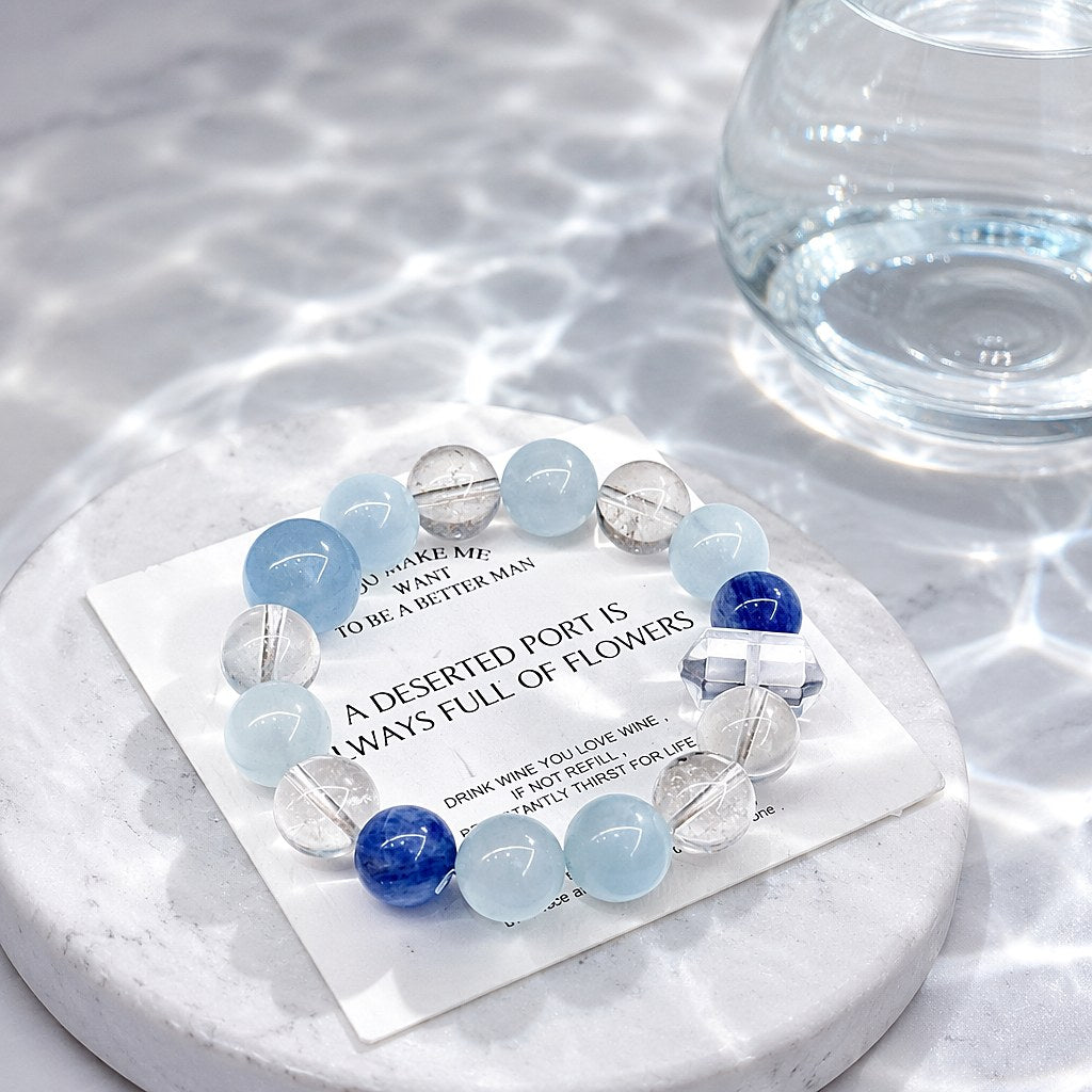 Aura of Serenity aquamarine, kyanite and clear quartz beaded stretch bracelet with faceted double-terminated clear quart