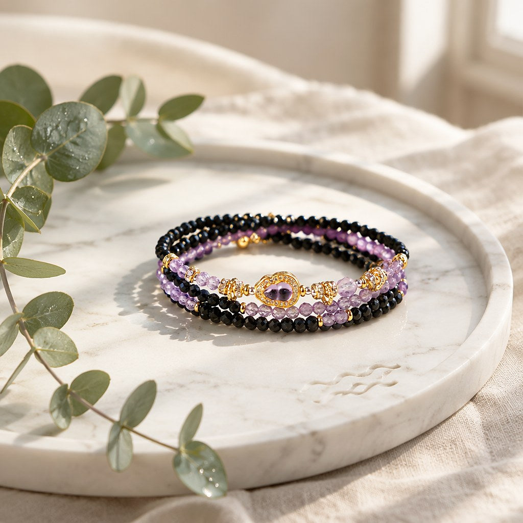 Aquarius zodiac triple-wrap bracelet with faceted black tourmaline mini-beads, 8mm amethyst statement bead, gold-tone zo