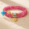 Taurus zodiac triple-wrap bracelet with faceted pink tourmaline mini-beads, turquoise accents, gold-tone Taurus charm an