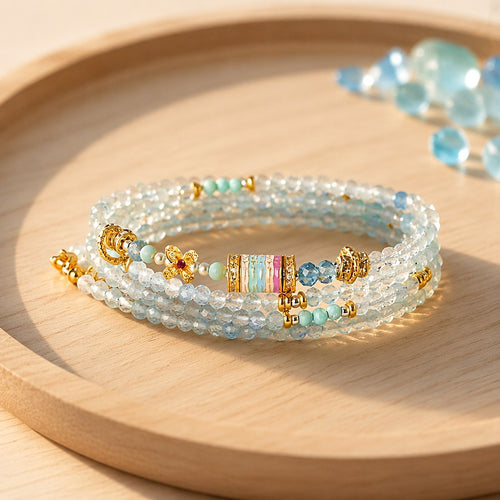 Cancer zodiac triple-wrap bracelet in 3mm faceted aquamarine with turquoise accents, five-color enamel barrel bead, gold