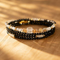 Scorpio zodiac triple-wrap bracelet in faceted black tourmaline with a 7mm clear quartz statement bead, citrine accents,