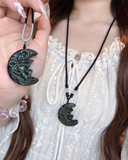Obsidian crescent fox pendant necklace, view 3