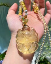 Yellow carved fox pendant necklace, view 2