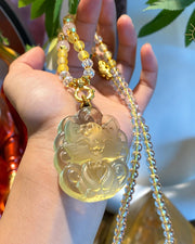 Yellow carved fox pendant necklace, view 6