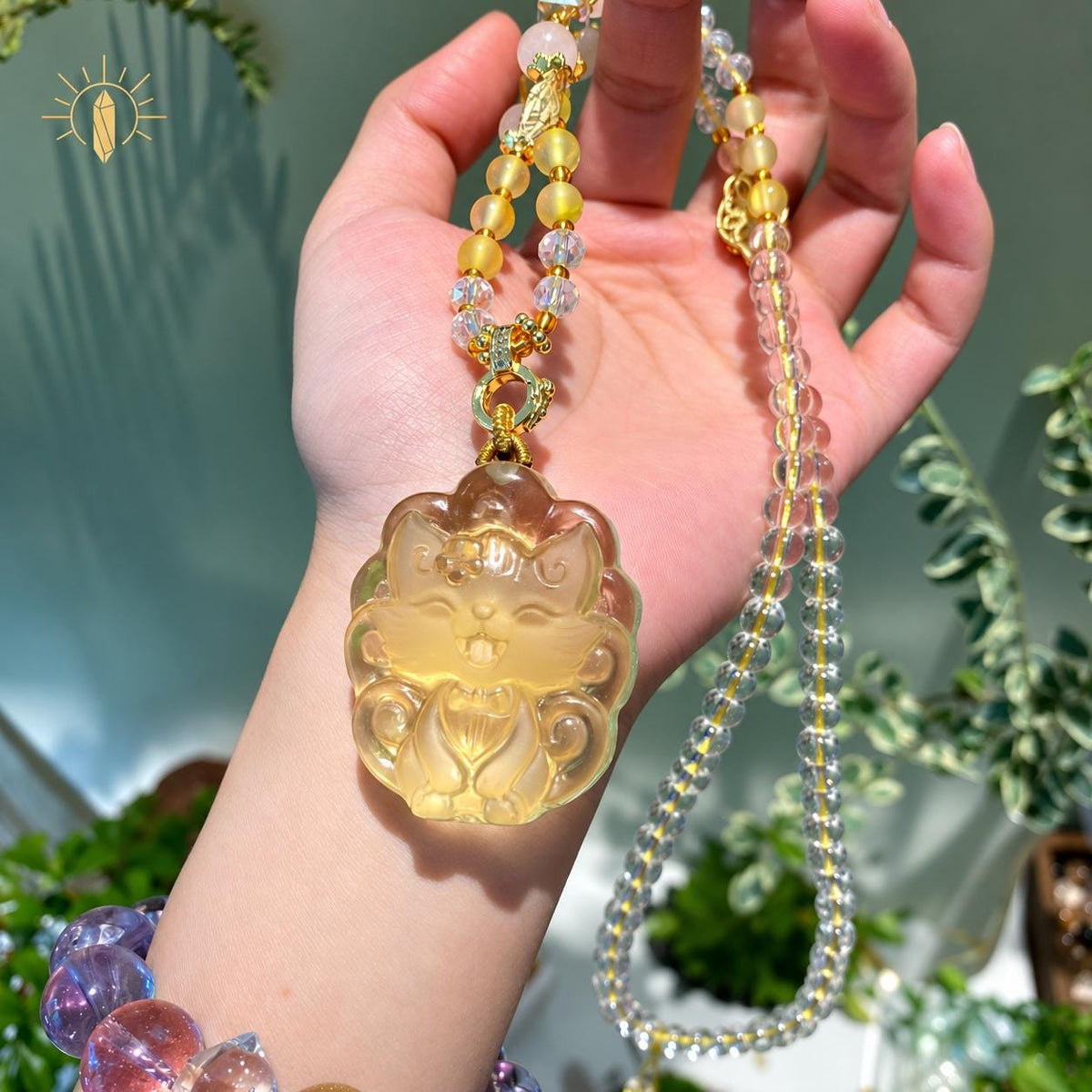 Yellow carved fox pendant necklace, front view
