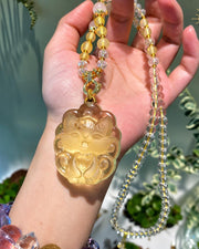 Yellow carved fox pendant necklace, view 5