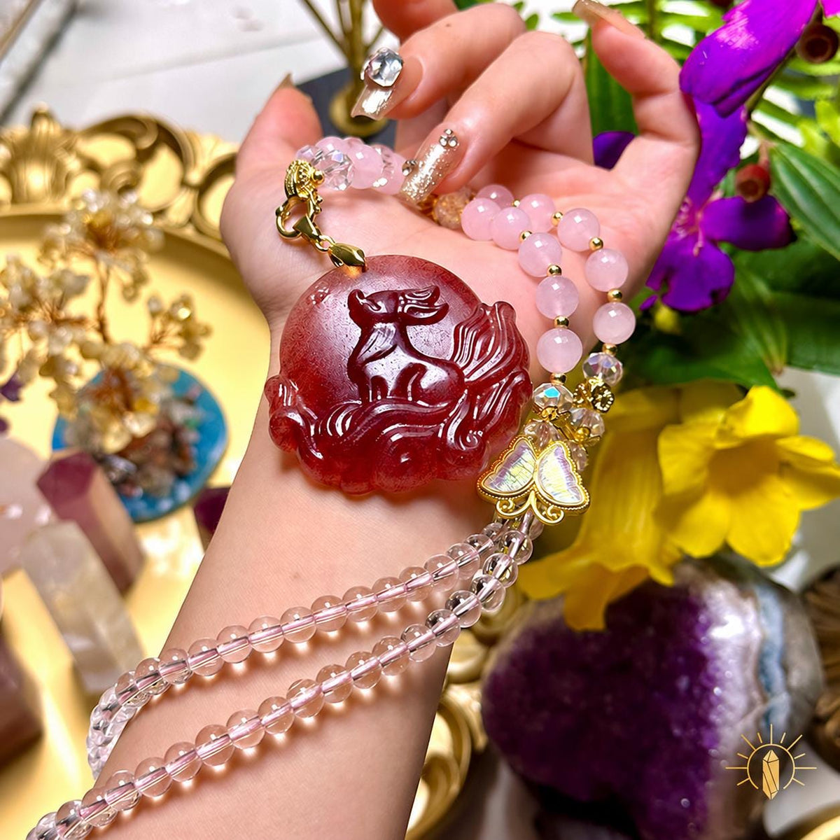 Red-pink carved fox pendant necklace, alternate view